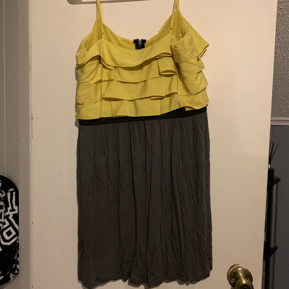 Gray and mustard color dress.